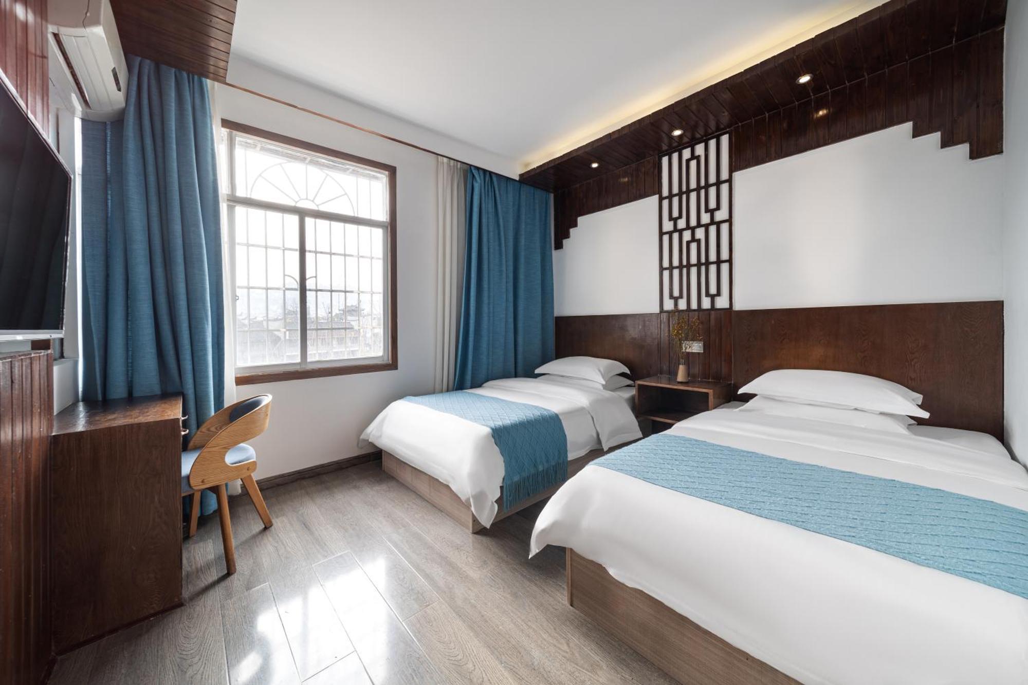 Fenghuang Weijianshan Guesthouse Bagian luar foto